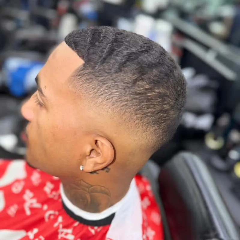 Waves with a high skin fade and a sharp line-up